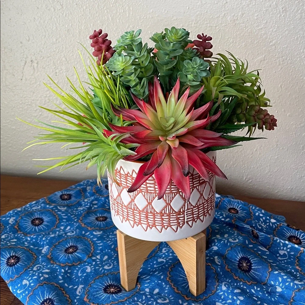 Contemporary Faux Succulent Mix in a Burnt Orange and White Ceramic Footed Vase